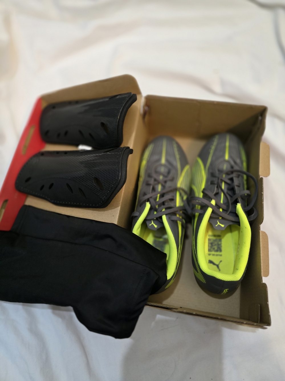 PUMA Men's Gray & Neon Yellow Soccer Cleats with Black Shin Guards